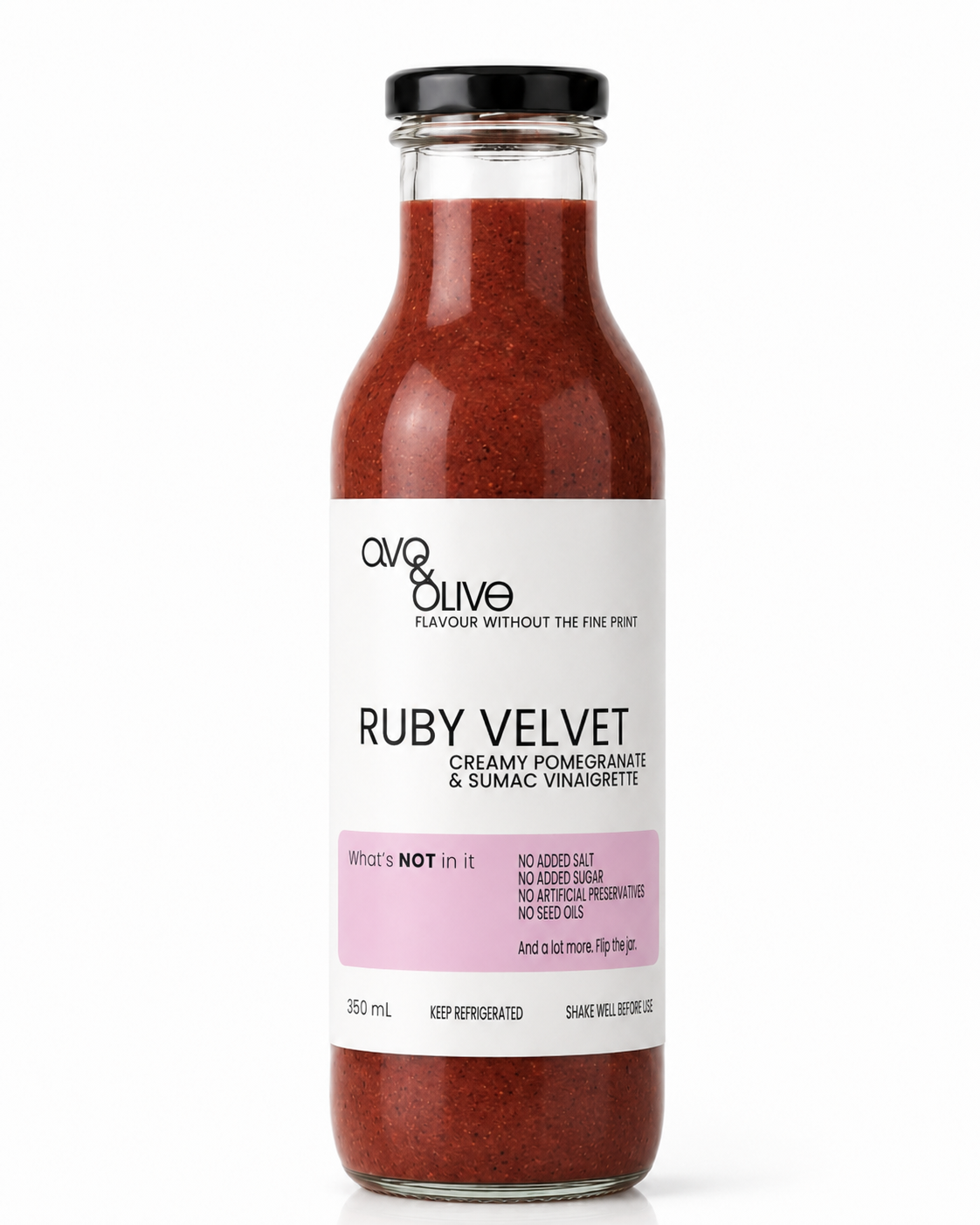 Bottle of Ruby Velvet salad dressing with a white label on a white background